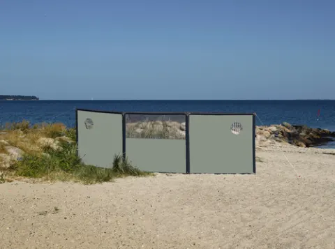 Sistema de protección de viento variable expandible en deseos