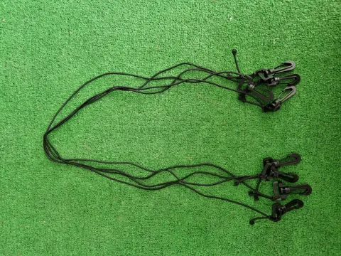 Tensor de goma para cierre de tienda de techo